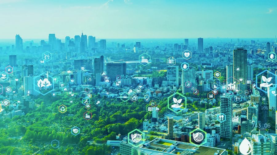 Image of city with digital sustainability icons on top of buildings
